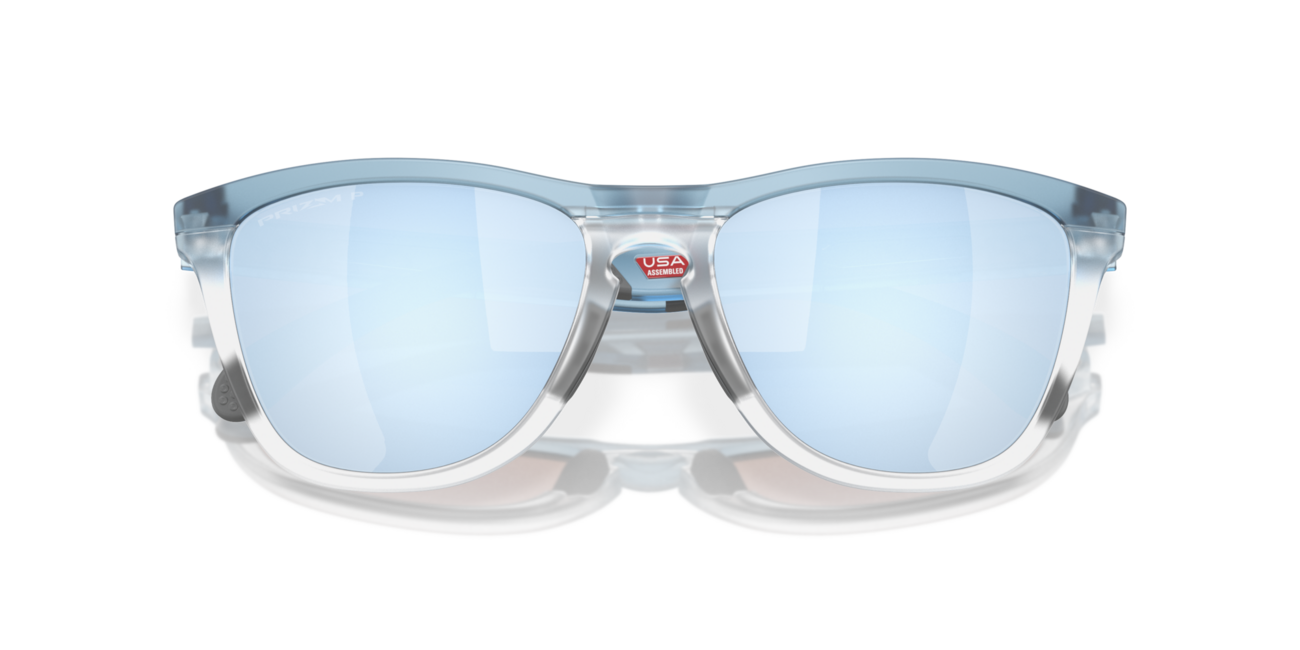 Oakley FROGSKINS RANGE слънчеви очила с рамка Trans каменно пране/прозрачен и со стъкла Prizm Deep Water Polarized, 55
