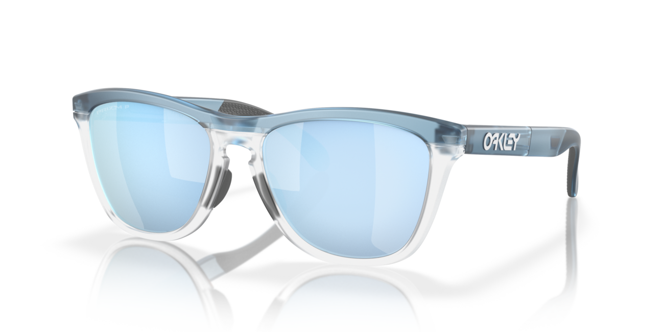 Oakley FROGSKINS RANGE слънчеви очила с рамка Trans каменно пране/прозрачен и со стъкла Prizm Deep Water Polarized, 55